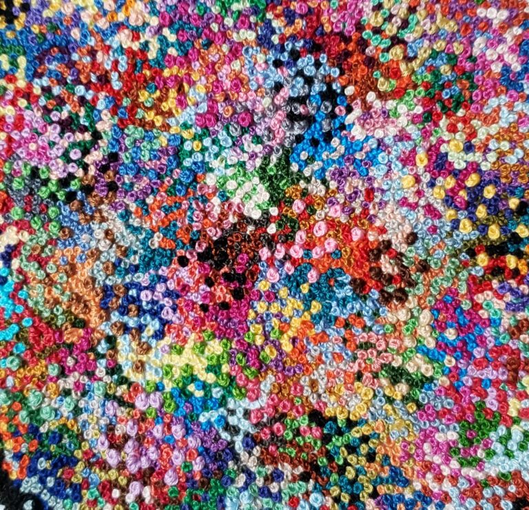 close-up of bright multicolored knitted dots