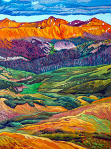 Colorful landscape with bright orange mountains casting a purple shadow agains rolling green hills and valleys